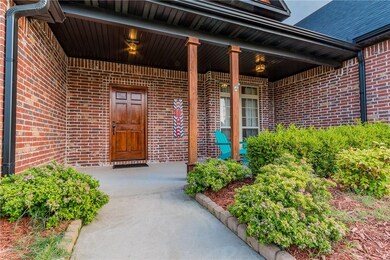 Inviting front porch with plenty of room for drink