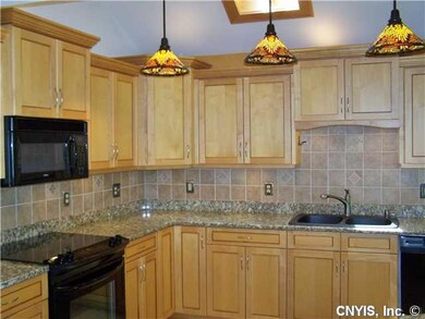 Kitchen Granite counters, tile backsplash, vaulted