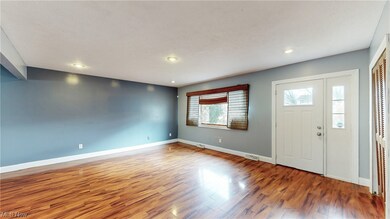 Foyer entrance featuring hardwood / wood-style flooring