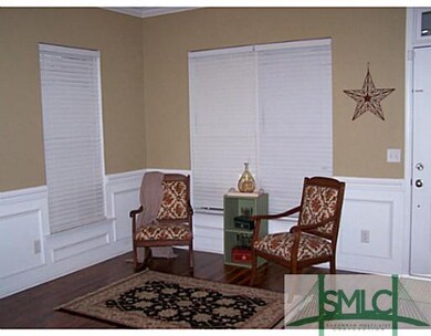 Living Room. Gorgeous laminate wood flooring throu
