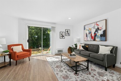 Cozy up in this inviting living room featuring a beautiful fireplace centerpiece.  Cozy up in this inviting living room featuring a beautiful fireplace centerpiece.