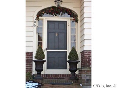 Exterior Front. Gracious front door faces the side