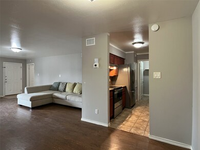 view of kitchen & living room from dining/breakfas