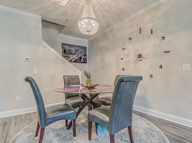 Dining area featuring hardwood / wood-style floors