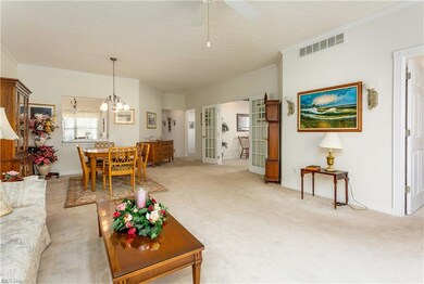 French doors off the living area lead to the offic