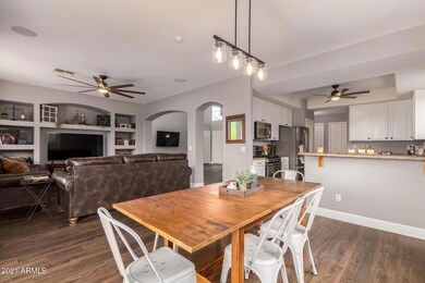 DINING OPEN TO FAM RM & KITCHEN