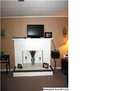 View of fireplace in living room