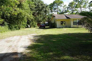 Left side of the house - view of extra room - walk to the back yard.