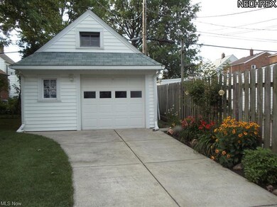 ONE AND HALF CAR GARAGE WITH ADDITIONAL STORAGE AB