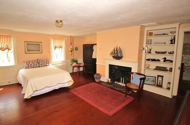 Center bedroom and fireplace