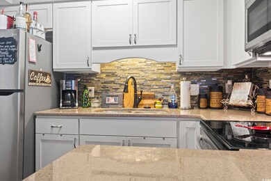 Kitchen featuring appliances with stainless steel 