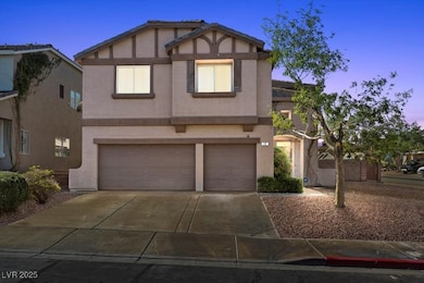 Tudor house with stucco siding, concrete driveway, an attached 3 car garage on a large corner lot with solar