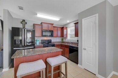 The island in the kitchen makes a great space to e