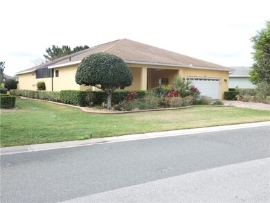 Left side of home showing partially screened court