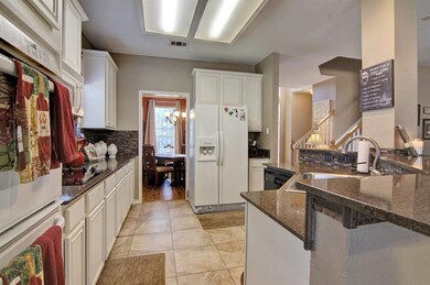 Double ovens, granite, updated ceramic tile, built