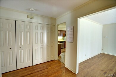 Gracious entrance foyer with hardwood flooring and