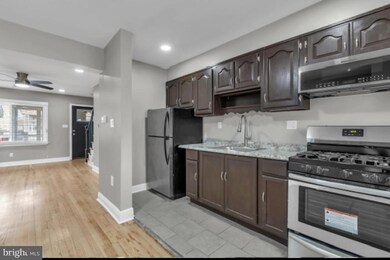 2923 Edgecombe Cir N, Baltimore, MD 21215 - photo 5