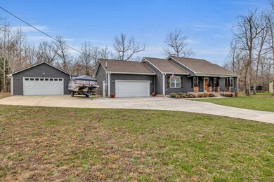 This adorable home showcases lots of space for vehicles and storage with not one but TWO 2-car garages. 418 N Ballard Rd  Manchester, TN 37355