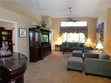ANOTHER VIEW OF GREAT ROOM SHOWCASING FULL WALL OF
