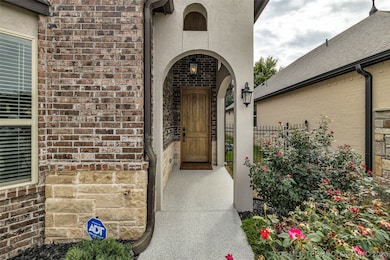 CHARMING ARCHED ENTRY WITH EPOXY WALK ENJOYING A 1