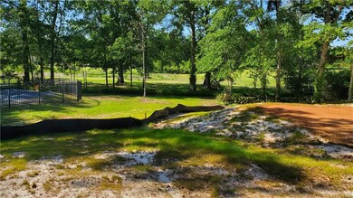 Side and back facing Golf Course Hole #12.