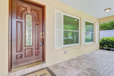 Covered and Screened Front Patio Entry