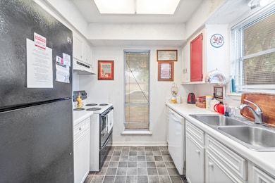 The kitchen is currently equipped with an electric