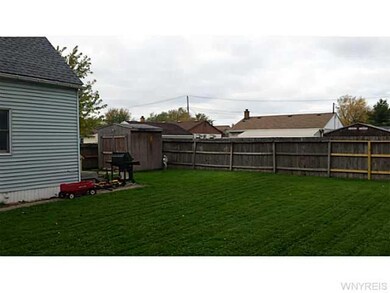 Backyard. Fully fenced backyard with storage shed 