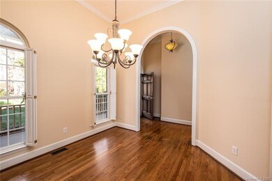 Beautiful formal Dining Room with high arched open