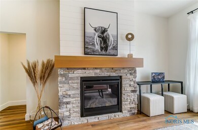 Cozy Gas Fireplace with Stone Surround