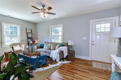 New Brazilian Tigerwood floors, new windows and do