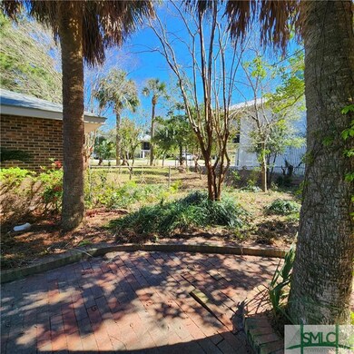 paver patio, lots of area to grow or plant in the 