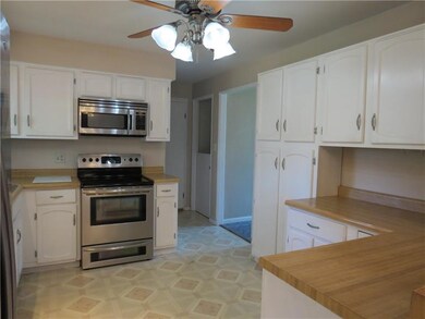Another view of the kitchen and all of its storage