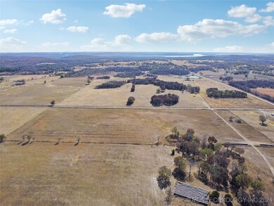 Plenty of pasture land, a few trees at the back.