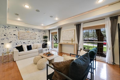 Living area with wallpapered walls, healthy amoun