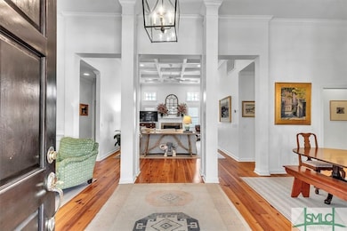 The front door opens into a spacious foyer, flanke