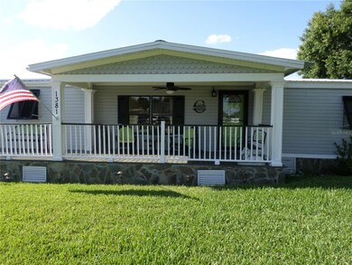 FRONT PORCH WITH COLUMNS & PA. BLUE STONE UNDERPIN
