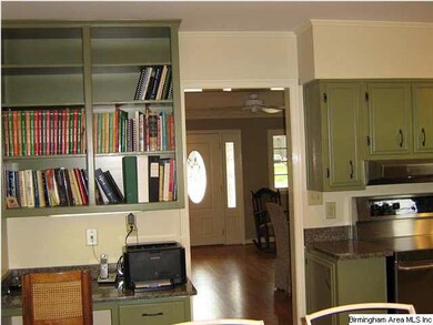 Built-in bookshelves and easy access to living roo