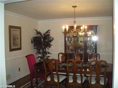 Dining Room - Formal dining room has hardwood floo