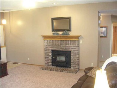 Living Room w/ Wood Burning Fireplace w/ Blower