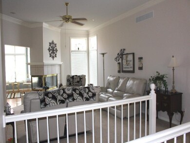 Great room, crown molding, see through fireplace, 