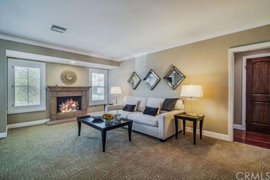 The front living room with gas log fireplace