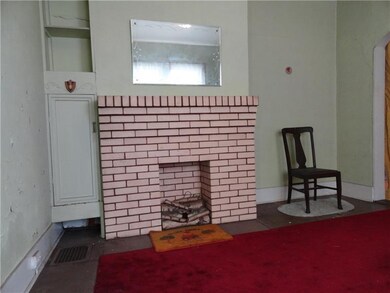This fireplace, in the living room, is strictly de