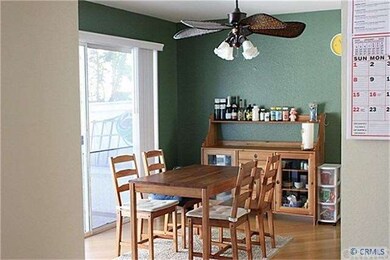 Dining area located conveniently close to kitchen.