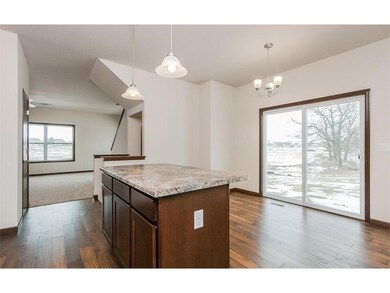 Breakfast Bar/Dining Area with sliders to deck