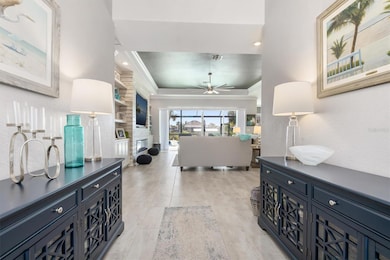 Grand entrance with view of the pool and water!