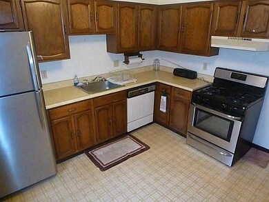 Kitchen. New refrigerator & gas stove.