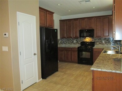 7764 Peaceful Trellis Dr, Las Vegas, NV 89179 - photo 6