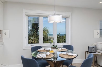 Dining room featuring baseboards and wood finished floors