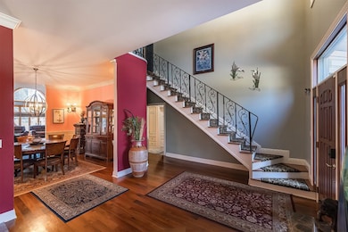 The grand foyer says Welcome Home.